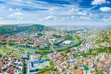 Sunny day with blue sky and white clouds in Tbilisi, Georgia