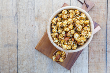 Obraz na płótnie Canvas Popcorn caramel mix macadamia and almond taste