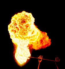 Fireshow, fire staff, explosion of fire on a black background