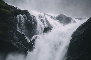 Rapid mountain waterfall in Norway
