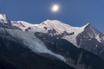 Mont Blanc by night in the moonlight. Alps.