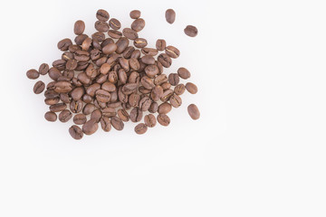 Roasted coffee beans on white background - Coffea