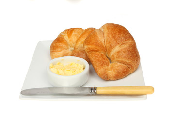 Croisants butter and knife