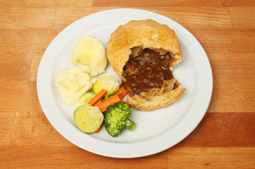 Meat pie meal on a table