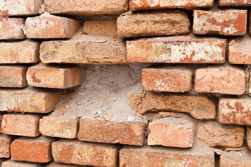 Naklejka premium Brick wall collapsing from erosion