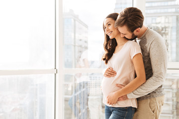 Attractive pregnant young couple