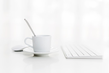 cup of coffee in addition to computing devices.