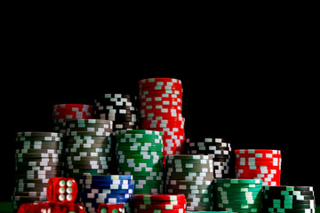 Casino chips on black background