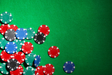 Chips on green table in casino