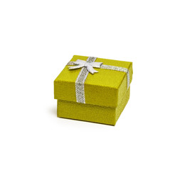 Yellow color gift box with silver ribbon isolated on white backg