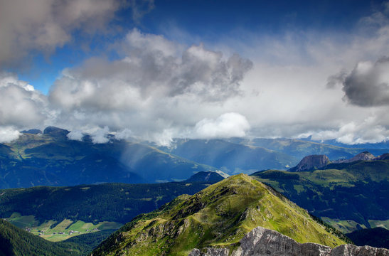 Summer rain shower sweeps over sunny Hochpustertal, Drava Drau valley, Kartitsch village, Villgratner and Gailtaler Alpen Lienzer Dolomiten mountains, view from Karnische Alpen Osttirol Austria Europe