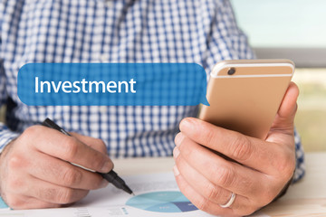 COMMUNICATION TECHNOLOGY CONCEPT: INVESTMENT WORD ON CHAT BUBBLE