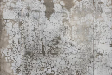 Fotobehang Verweerde muur Natte betontextuur met scheuren