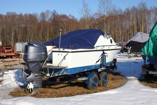 Winter boats parking - boat on trailer