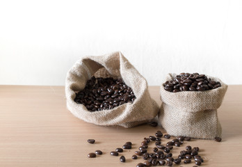 Coffee beans placed on wooden boards.