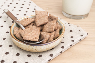 bowl with chocolate cereal and milk
