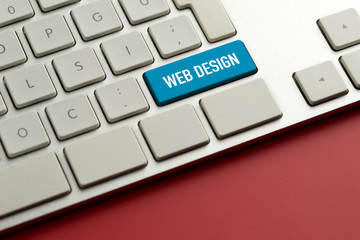 Computer key showing the word WEB DESIGN