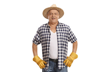 Elderly farmer looking at the camera and smiling