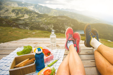 Legs of traveler couple