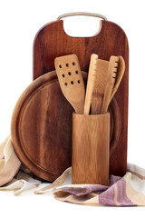 Wooden kitchenware on white.