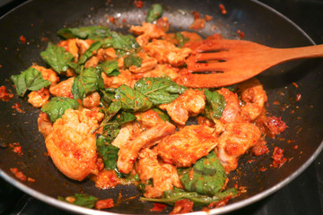 spicy stir fried pork with red curry paste