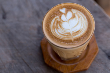 Backgrouds of latte coffee on table.