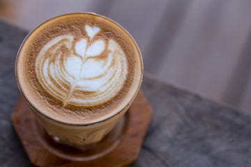 Backgrouds of latte coffee on table.