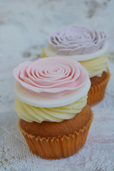large roses on cupcakes