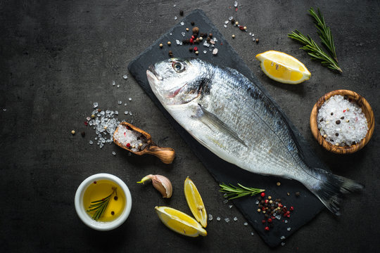 Dorado and ingredients for cooking