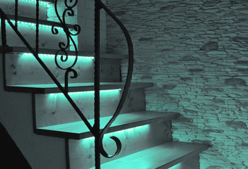 Green-blue (turquoise) LED lighting wooden stairs