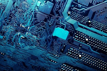 Close up of a printed blue computer circuit board
