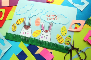 Happy Easter . Baby card with Easter bunnies. application of colored paper