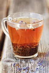 Hot herbal tea with lavender on the table 