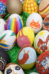 Detail of colorful, painted Easter eggs with different forms and animals