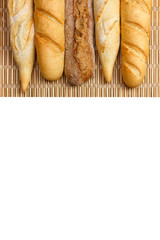 baguette of whole wheat bread on a white background