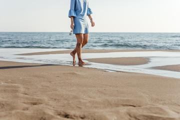 Woman walking on the Beach