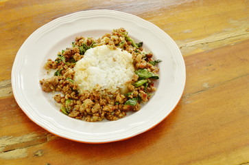 spicy fried minced pork with basil leaf on rice