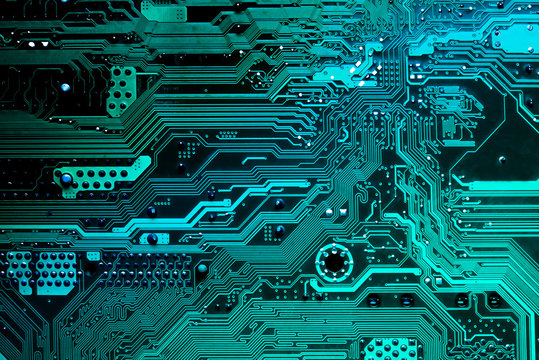 Close up of a printed blue computer circuit board
