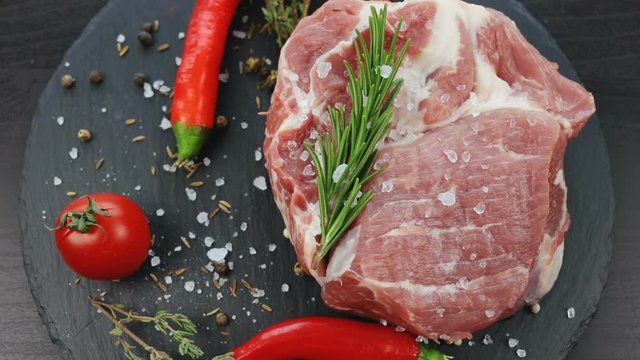 close up top view of fresh raw slices of meat with hot spice salt and pepper. uncooked meal garlic healthy tasteful food macro salt tasty dinner bbq menu cooking cuisine eco product delicious steak