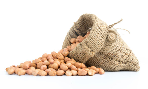 Peanuts In Burlap Sack Isolated On White