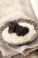 Black truffles and white rice.