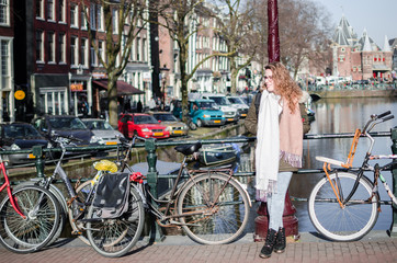 Fototapeta premium Photograph of a girl in the streets of Amsterdam
