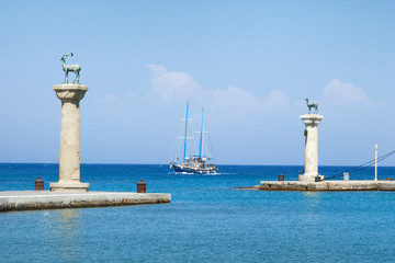 Naklejka premium Deer statues at the entrance to Mandraki Harbour, Rhodes Island, Greece
