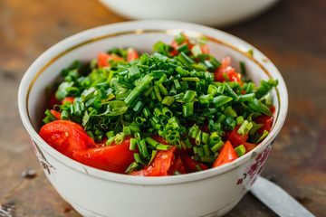 preparation of salad from fresh vegetables, healthy diet