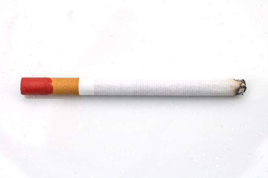 Lit Cigarette with Red Lipstick Stain on the Butt