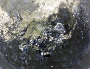 Water Surface Splash Inside The Fountain