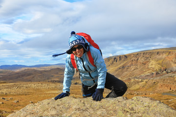 Tourist woman alpinist