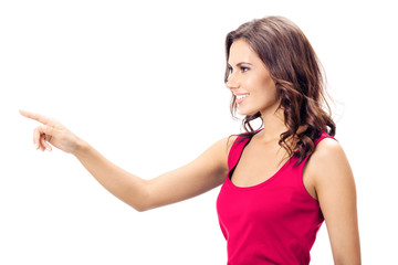 Fototapeta premium Beautiful young woman showing, on white