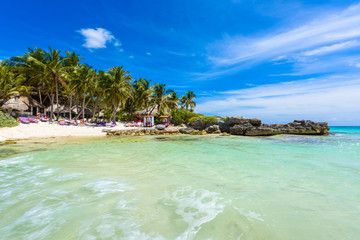 Recreation at paradise beach resort with turquoise waters of Caribbean Sea at Tulum, close to Cancun, Riviera Maya, tropical destination for vacation, Mexico