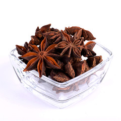  Anise in a glass bowl on a white background